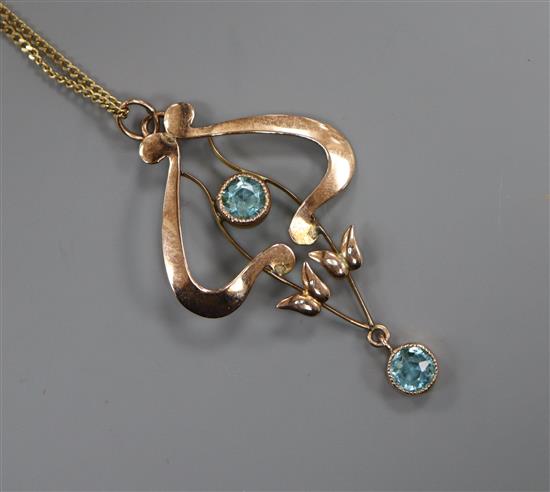 An Art Nouveau 9ct and blue zircon set drop pendant, on a later 9ct chain, pendant 4cm.